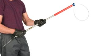 duty gloves holding catch rod